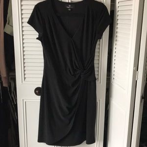 Flattering side tie black dress